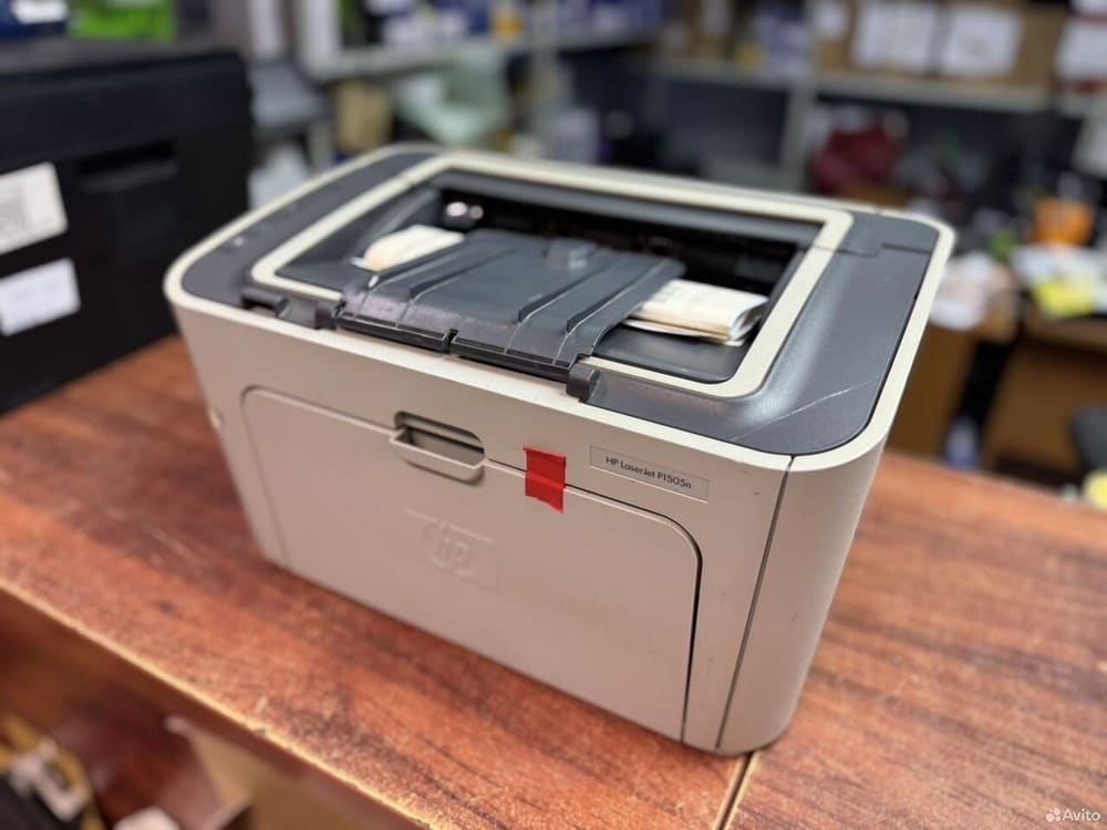Принтер лазерный HP LaserJet P1505n LAN — фото 1